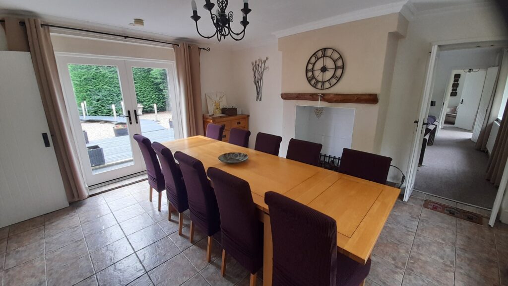 Large, flexible dining space for gatherings and gaming.