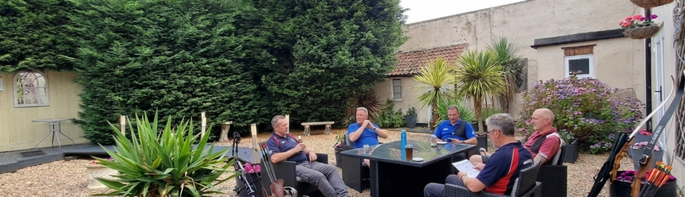 Archery, longbow and heritage groups relaxing in the East Wing courtyard.